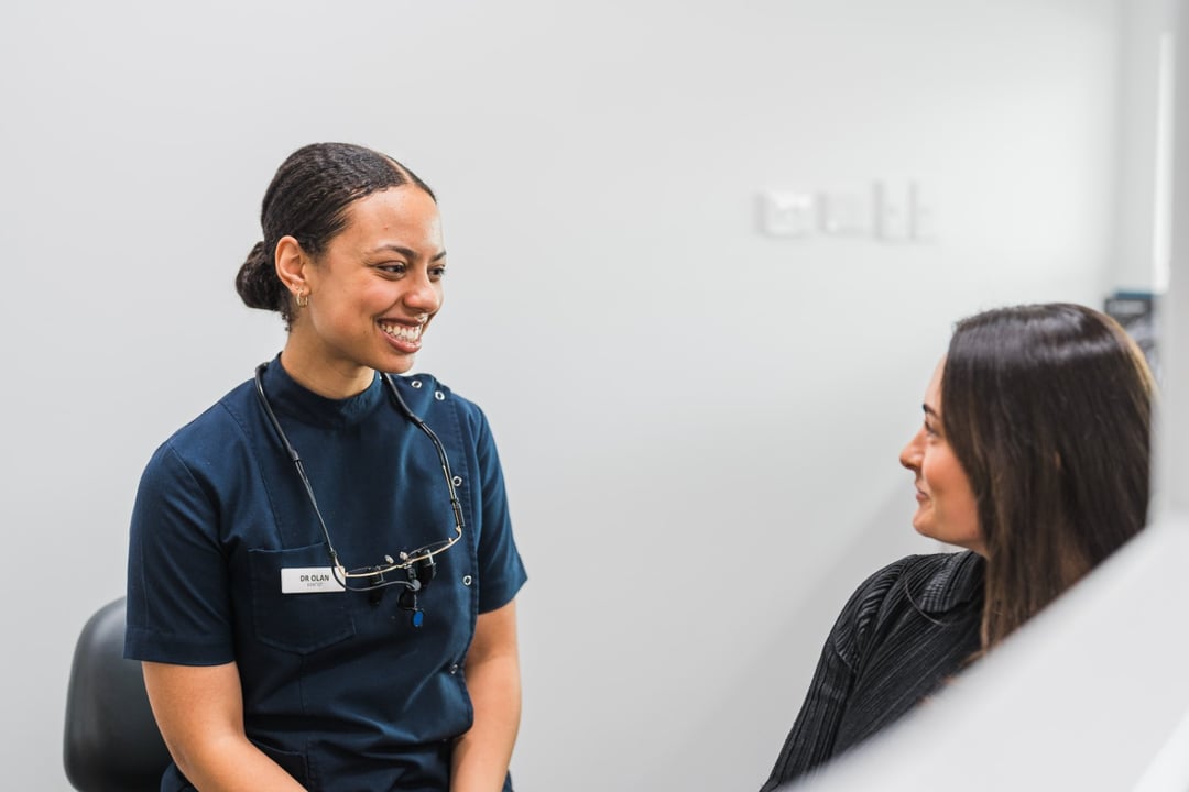 An Innova Dental dentist sharing a laugh with a patient during an unhurried consultation